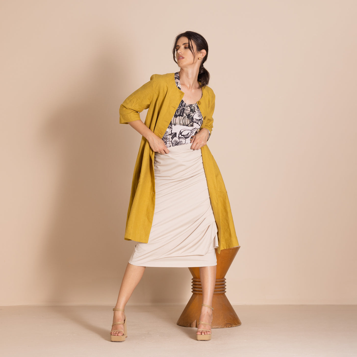 Megan Salmon - Lulu Pleat Merchant Coat. Avocado.