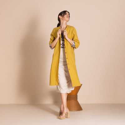Megan Salmon - Lulu Pleat Merchant Coat. Avocado.