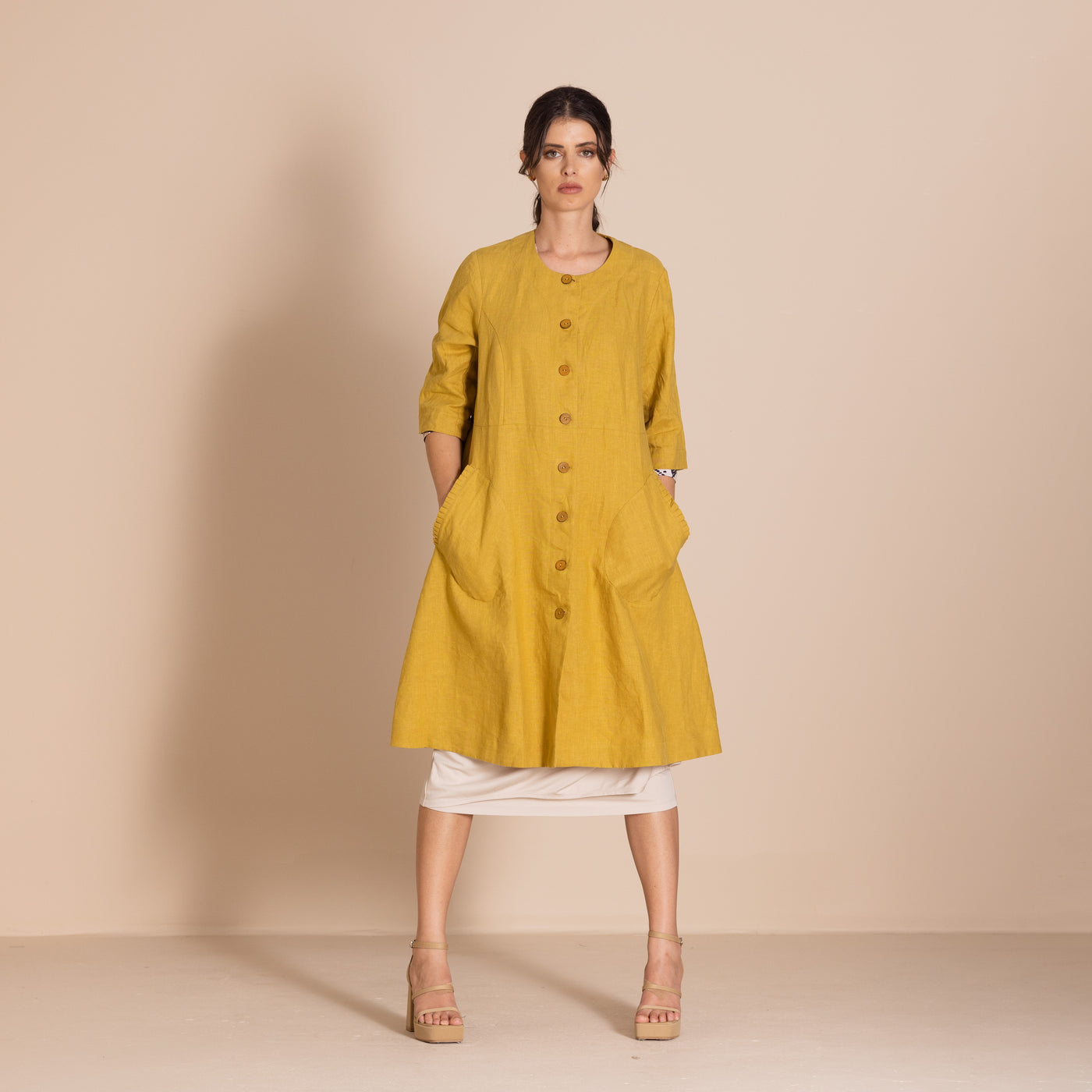 Megan Salmon - Lulu Pleat Merchant Coat. Avocado.
